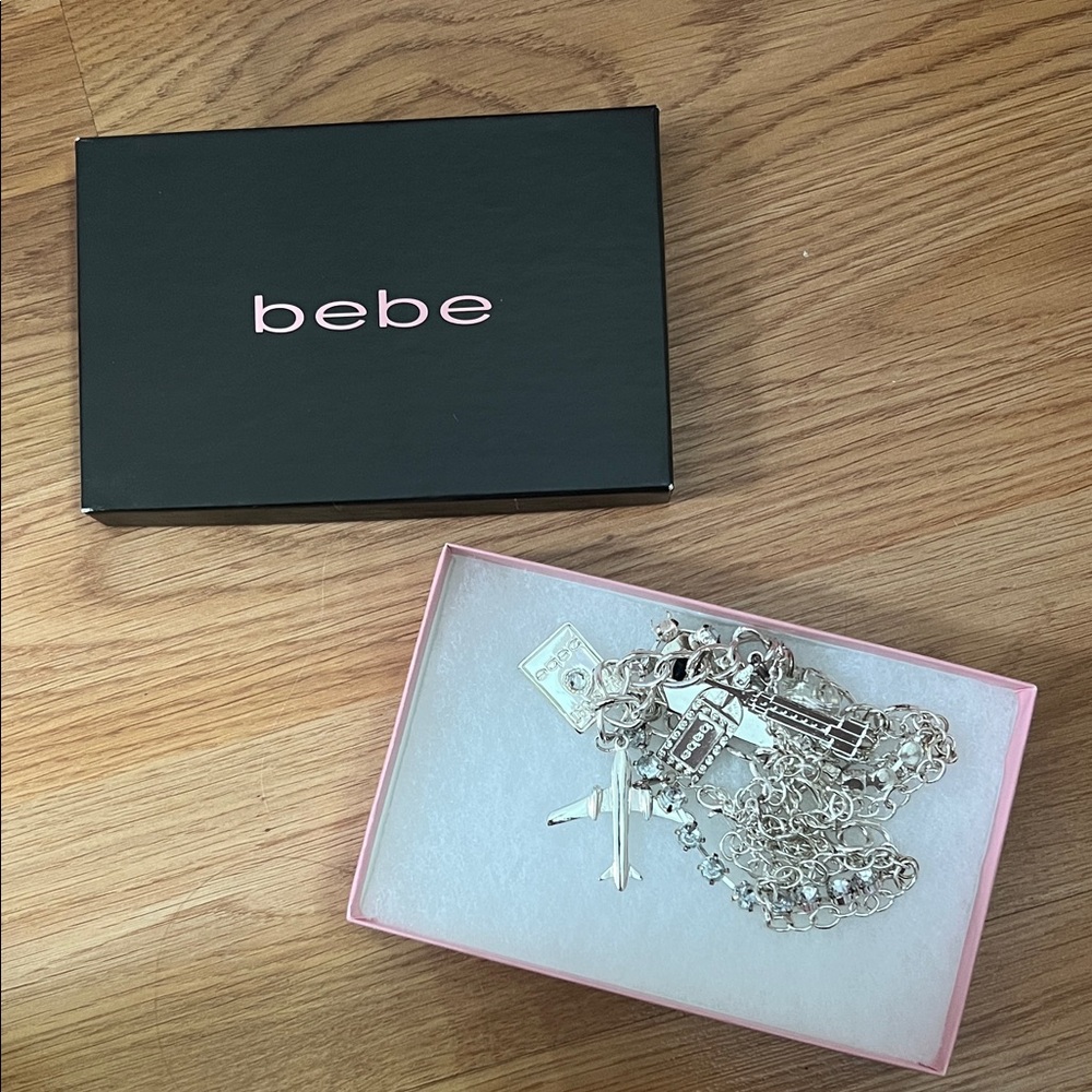 Bebe Silver Charm necklace with Unique Charms